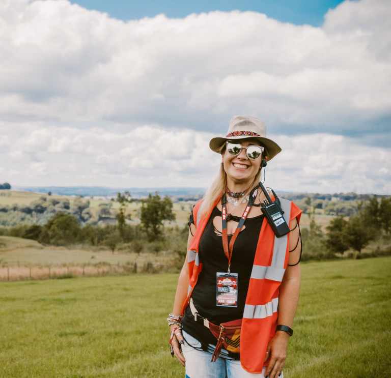 Steelhouse Festival steward Sarah Price with countryside in the background